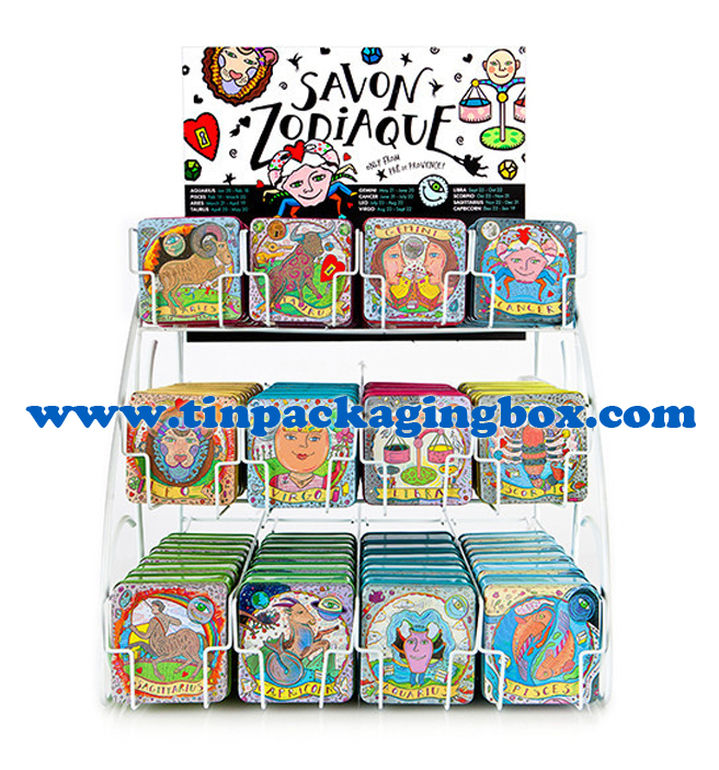 Zodiac design square soap tin boxes on display rack
